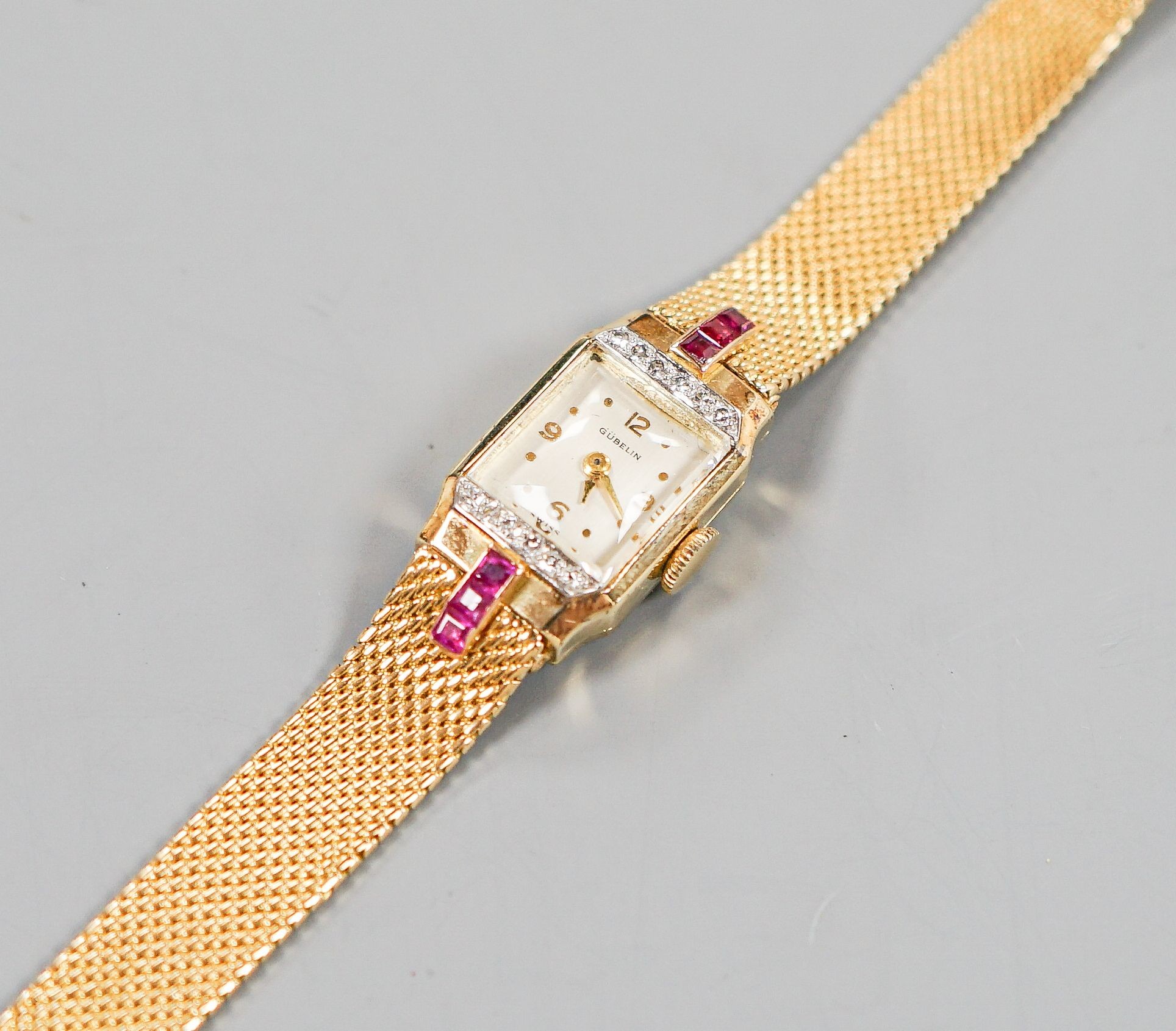 A lady's 18ct gold, ruby and diamond set Gubelin manual wind cocktail watch